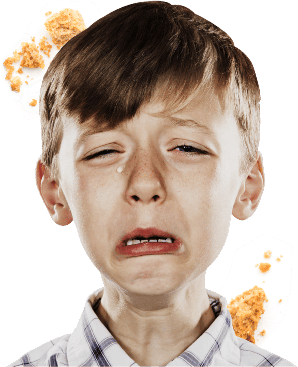 little boy crying with cookie crumbles